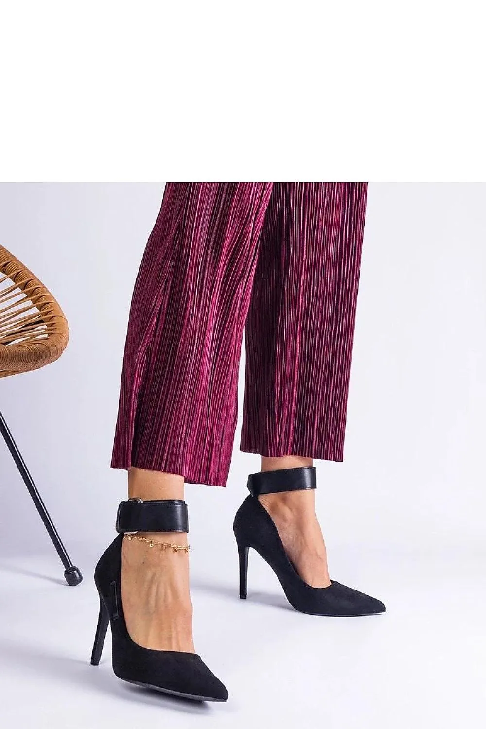 Black suede pumps with a stiletto heel