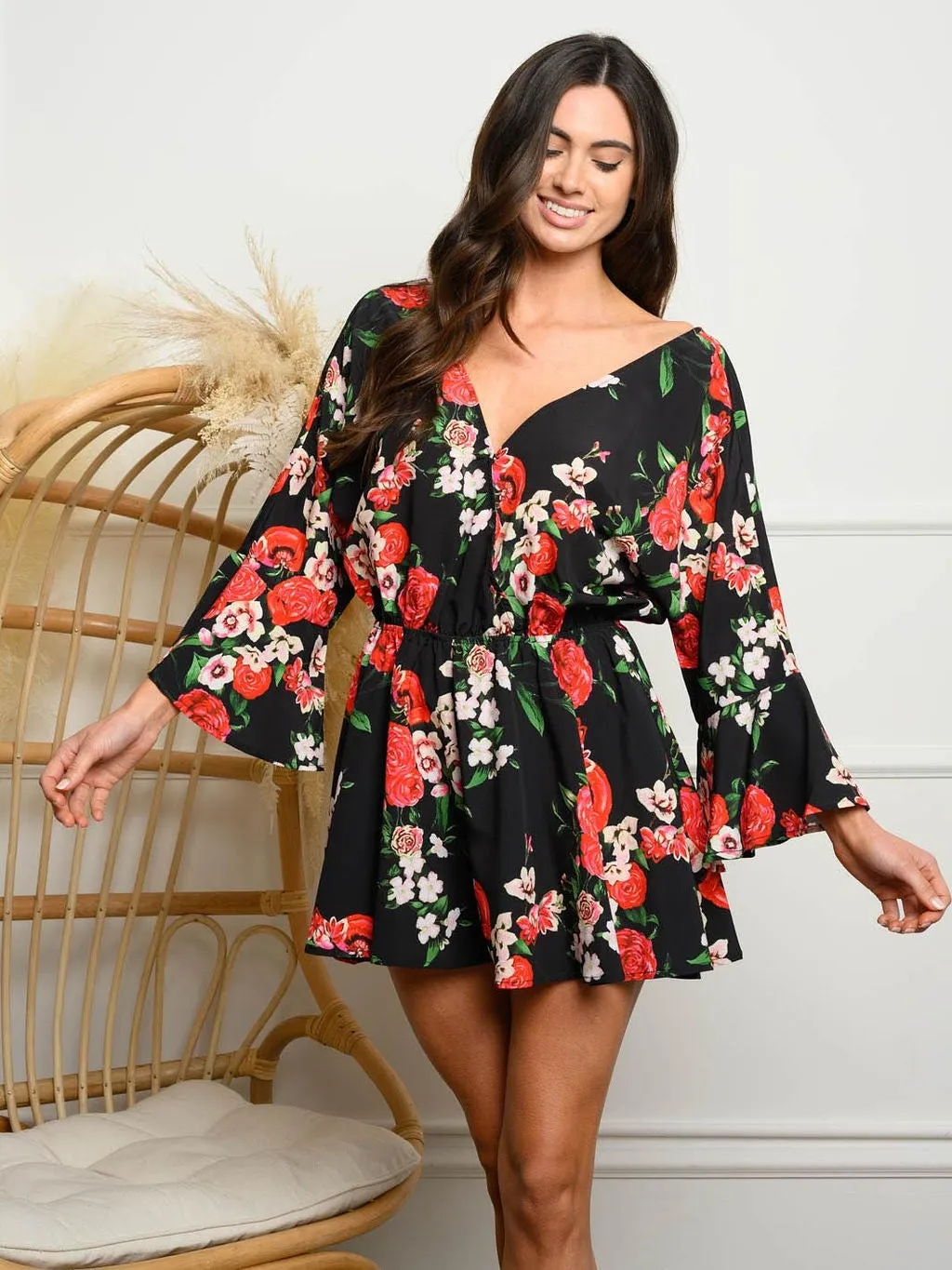 WOMEN'S BELL SLEEVE FLORAL SURPLICE ROMPER